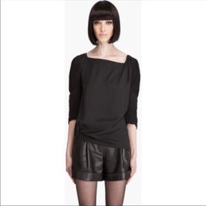 Diane don faustenberg size 2 black pleated blouse.